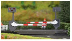 TrainTech TTLC10PDAM LEVEL CROSSING BARRIER SET WITH LIGHT & SOUND (OO GAUGE) PAIR DAMAGED PACKAGING